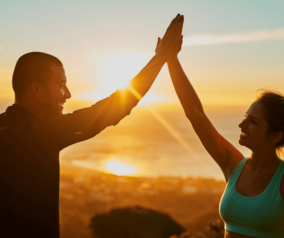 Men and woman giving hands